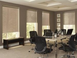 Motorized roller shades in office